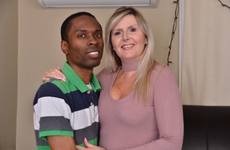 Horny mom Velvet Skye gives a young black guy a great fucking lesson