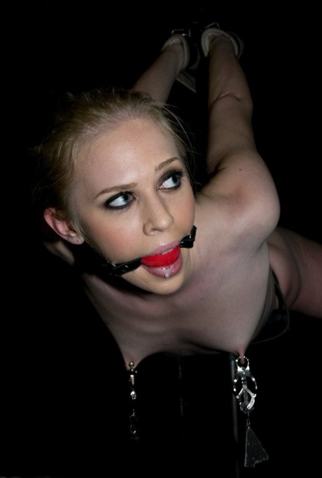 Blonde MILF Samantha Sin has her nipples weighted while in bondage