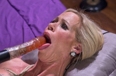 Bound mature slut Simone Sonay gets her holes toyed by lezdom Mona Wales